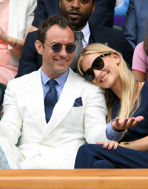 This, right here, is how you wear a white suit in the summertime. The light blue shirt and navy accessories keep it from looking too pristine and precious. The devil-may-care attitude helps, too.