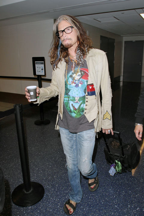 Next: Steven Tyler, who apparently found a Hot Topic in the airport and bought everything he could get his hands on.